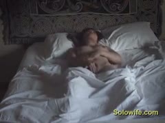 The wife was caught on camera watching porn while caressing her moist cunt.